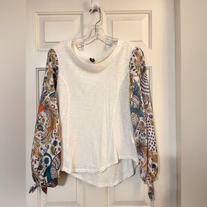 Women’s top. Cotton shirt and rayon sleeves. Fun pattern and funky.